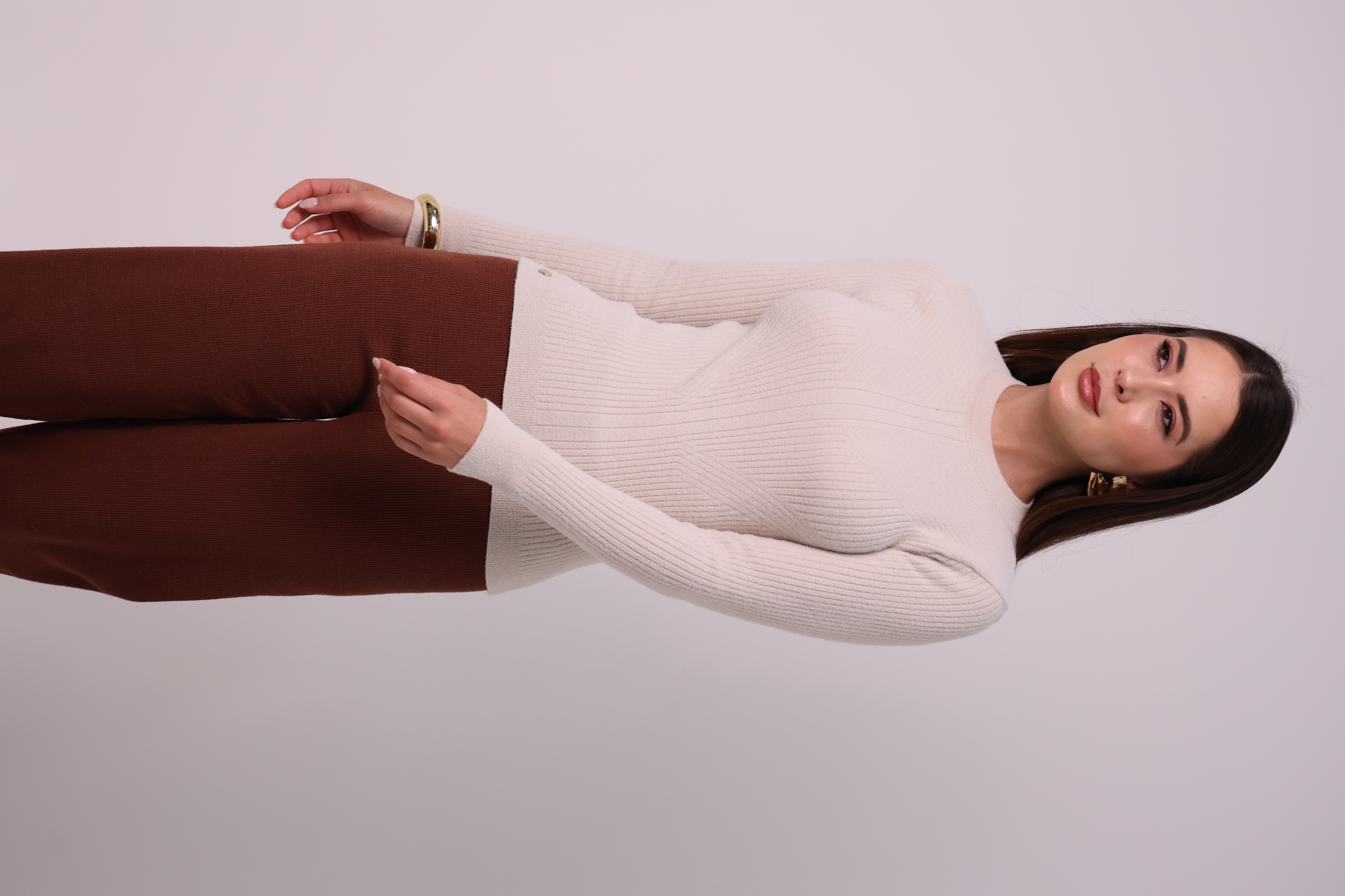 BLUSA CANELADA PLUMA - hover